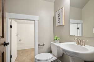 Bathroom with toilet and a sink