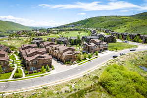 Aerial perspective of suburban area with mountains