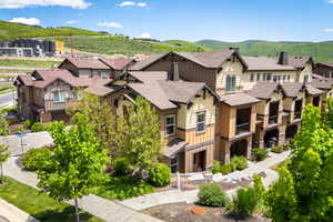 Aerial perspective of suburban area with mountains