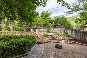 View of fenced backyard
