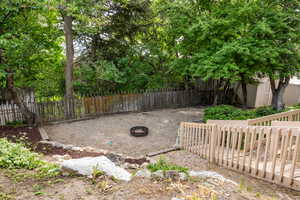 View of fenced backyard