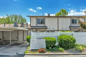 View of front of home with stucco siding