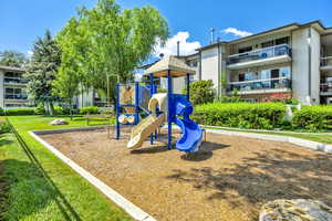 Community playground with a yard