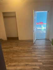 Hall with wood finished floors