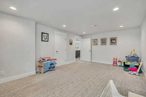 Playroom featuring recessed lighting, baseboards, and carpet floors