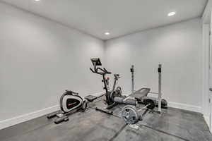 Workout area featuring recessed lighting and baseboards
