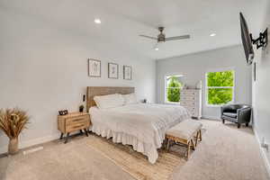 Bedroom with light carpet, baseboards, recessed lighting, and ceiling fan
