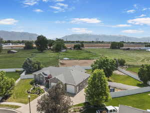 Overview of rural landscape featuring a mountainous background