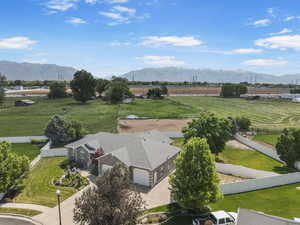 Aerial view of sparsely populated area with a mountainous background