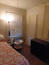 Bedroom featuring wood finished floors