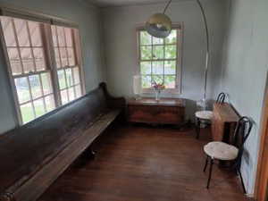 Living area featuring wood finished floors