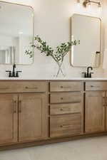 Bathroom featuring double vanity