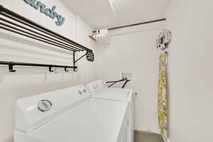 Laundry area featuring washing machine and dryer