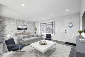 Living room featuring recessed lighting and plenty of natural light