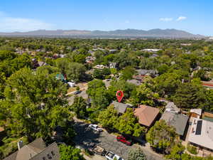 Aerial view of residential area featuring a mountain backdrop