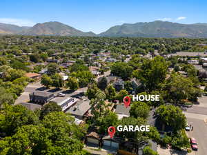 Aerial view of residential area with a mountainous background