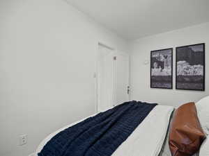 Bedroom featuring baseboards
