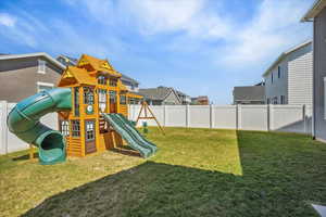 View of play area with a residential view