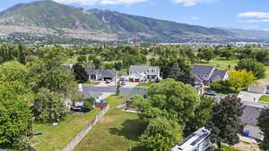 Aerial perspective of suburban area featuring mountains