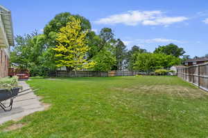 View of yard featuring a wooden deck