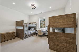 Carpeted bedroom featuring recessed lighting