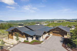 View of subject property featuring a mountain backdrop