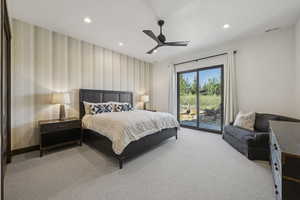 Bedroom with access to exterior, carpet, wallpapered walls, recessed lighting, and a ceiling fan