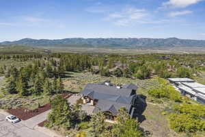 View of subject property with mountains