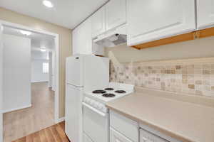 Basement kitchen maximizes space and functionality--perfect for guests, entertaining, or private in-law setup. Everything you need in a compact, convenient space.