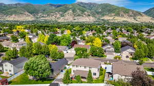 Aerial view of residential area with  mountainous background