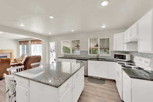 The open-concept kitchen flows into the spacious Great Room, perfect for entertaining and everyday living.
