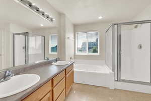 Full Master Bath featuring large separate shower, garden tub with jets, double vanity, with a separate enclosed toilet area