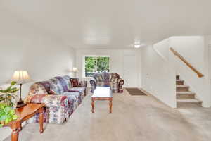 Tiled entrance to Living Room, view to front porch