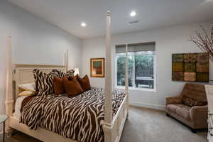 Bedroom with carpet flooring and recessed lighting
