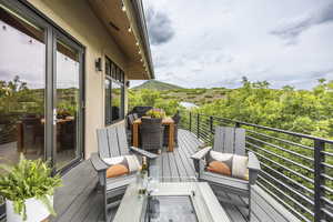 Balcony featuring area for grilling