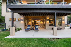 Patio / terrace with a patio area and a yard
