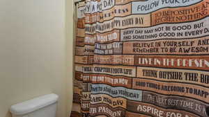 Full bathroom with toilet