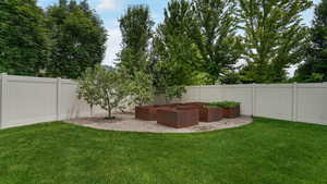 View of yard featuring a vegetable garden