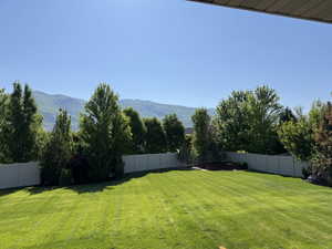 View of yard with a mountain view
