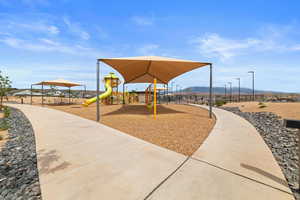 Community jungle gym featuring a mountain view