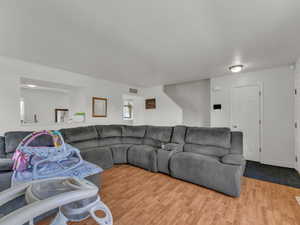 Living room featuring wood finished floors