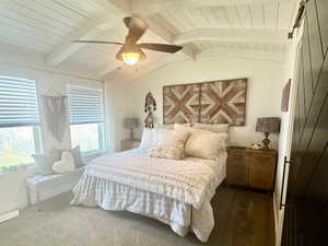 Master Bedroom with wooden ceiling, ceiling fan, and dark carpet