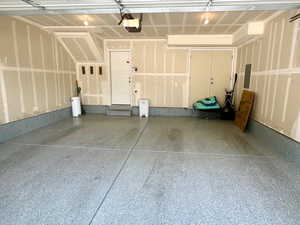 Garage featuring a garage door opener