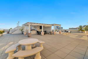 View of patio / terrace with a pergola and outdoor dining area