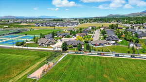 Aerial view of residential area featuring a mountainous background