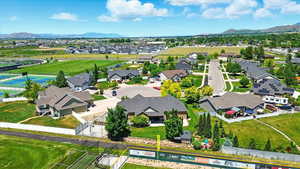 Aerial view of residential area featuring a mountain backdrop