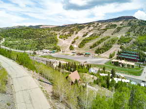 Aerial overview of property's location with mountains