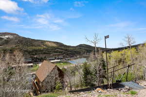 View of mountain background with a nearby body of water