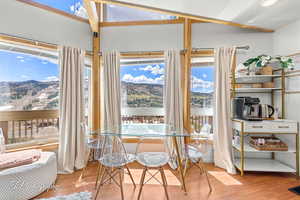 Dining space featuring wood finished floors