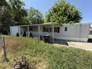 View of front of property featuring a porch